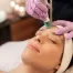 woman having microdermabrasion facial treatment